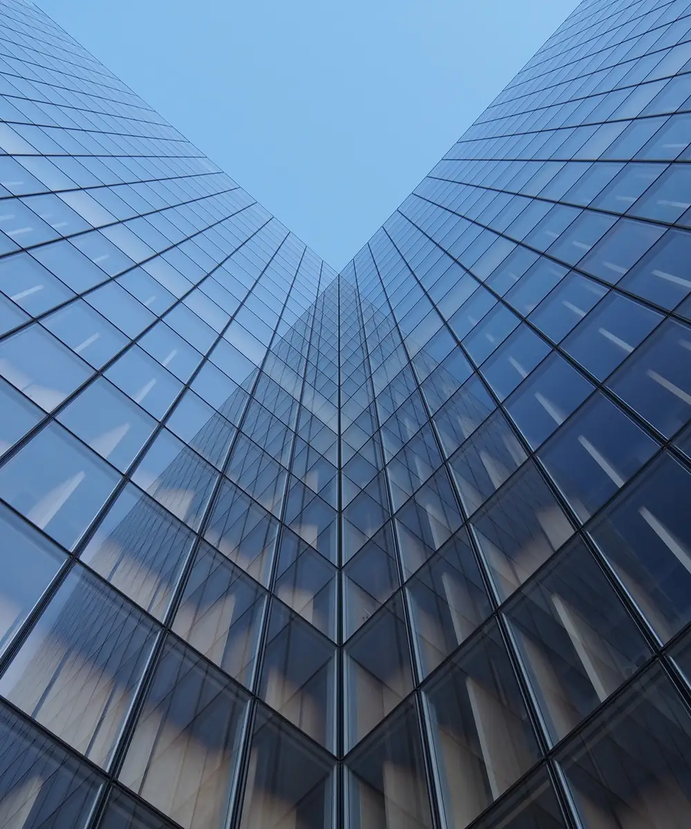 Glass office towers seen from below
